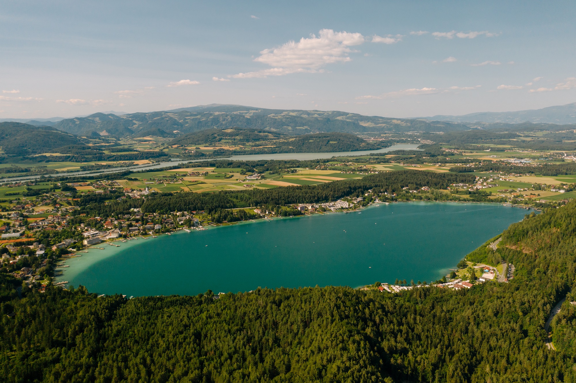 Der Klopeiner See in Suedkaernten lädt zum Radfahren und Baden ein